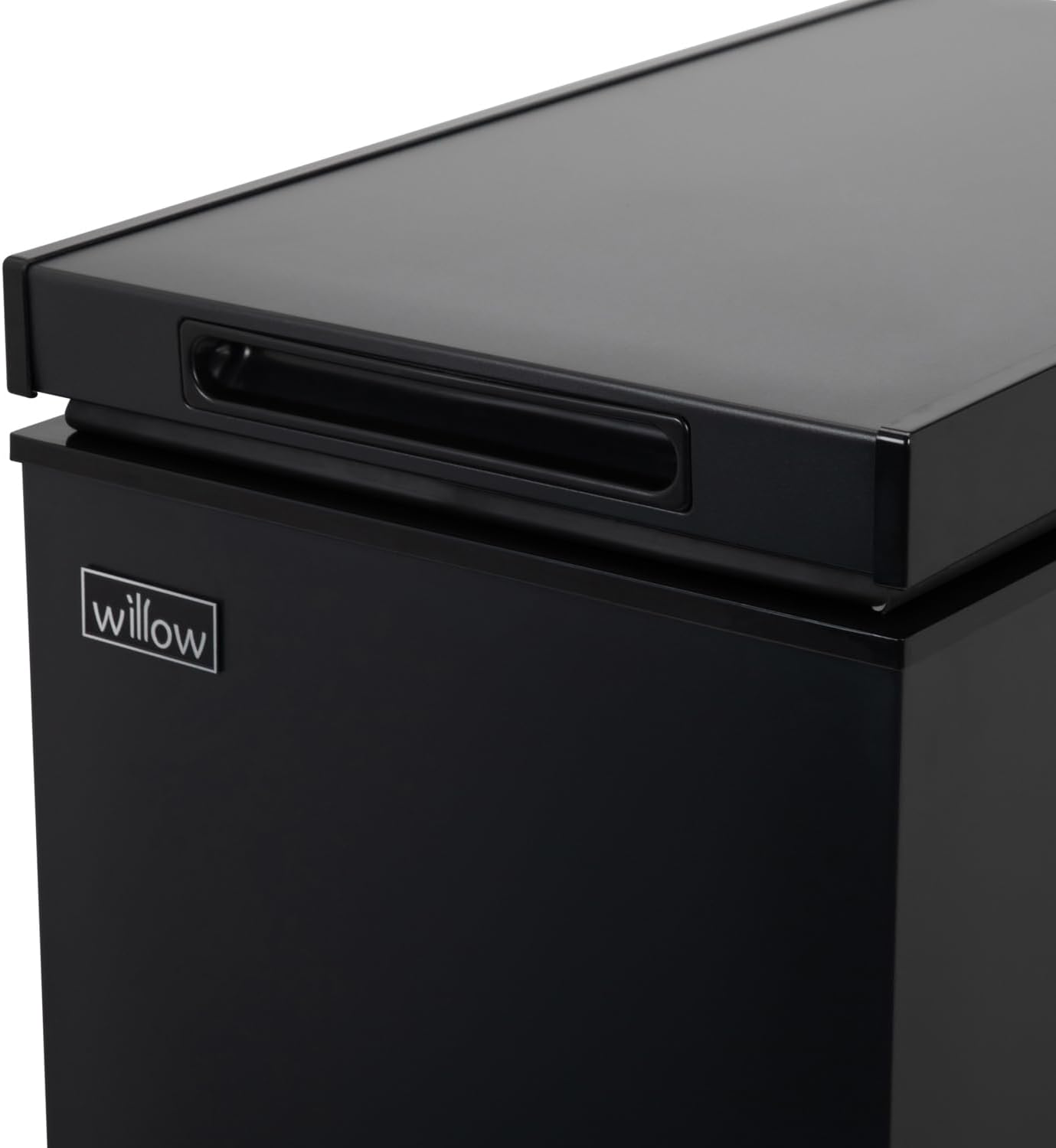 Top view of Willow WCF60B freezer with closed lid and compact design.