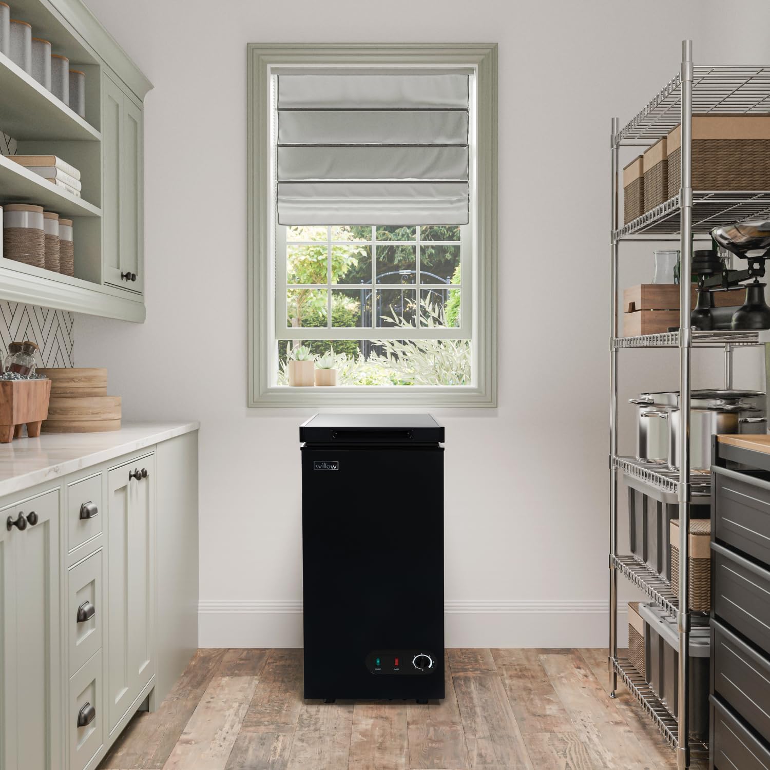 Willow WCF60B slimline chest freezer shown in a modern kitchen environment.